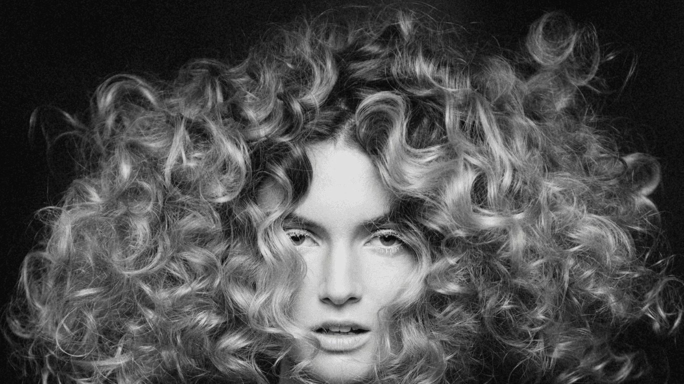 Professional portrait of a Jayne Elliott Hair Company stylist, representing the skilled and friendly team at our Lutterworth salon.