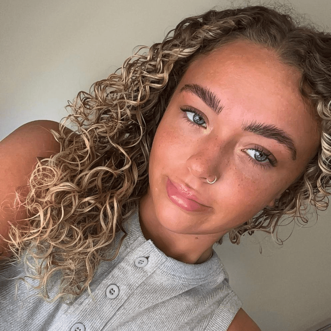 Tilly May Goodwin, Graduate Stylist at Jayne Elliott Hair Company in Lutterworth, specialising in early-career hairdressing with a passion for client care.